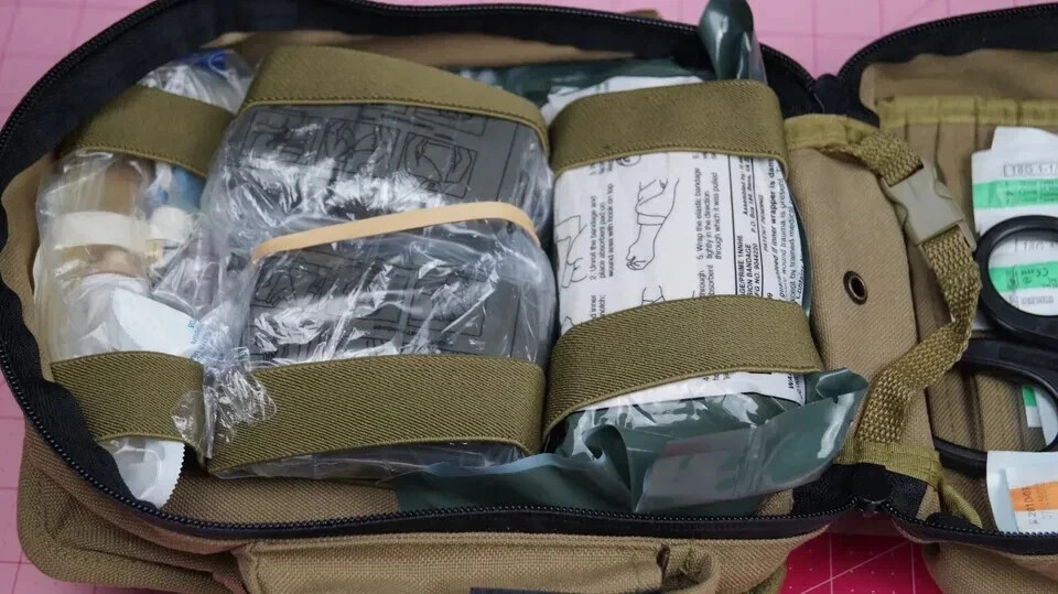 North American Rescue Combat Casualty Response Kit With Med Supplies See photos