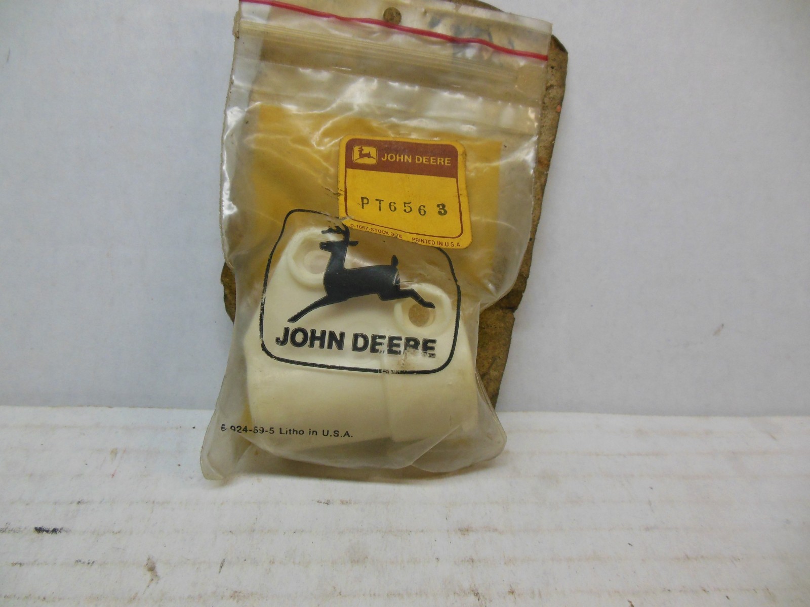 JOHN DEERE PLASTIC CLAMP BRACKET PT6563 OEM NOS
