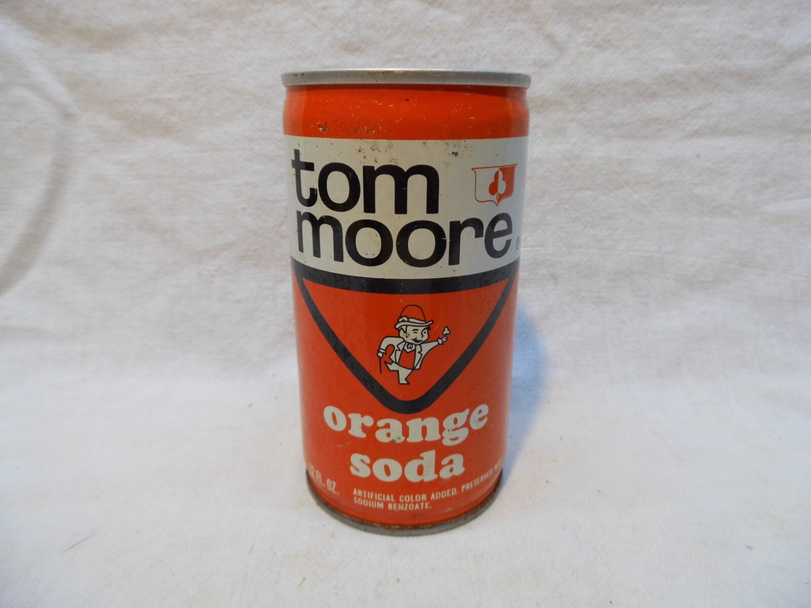 TOM MOORE ORANGE C/S SODA CAN~COCA COLA BOTTLING MIDWEST INC, ST PAUL, MINN