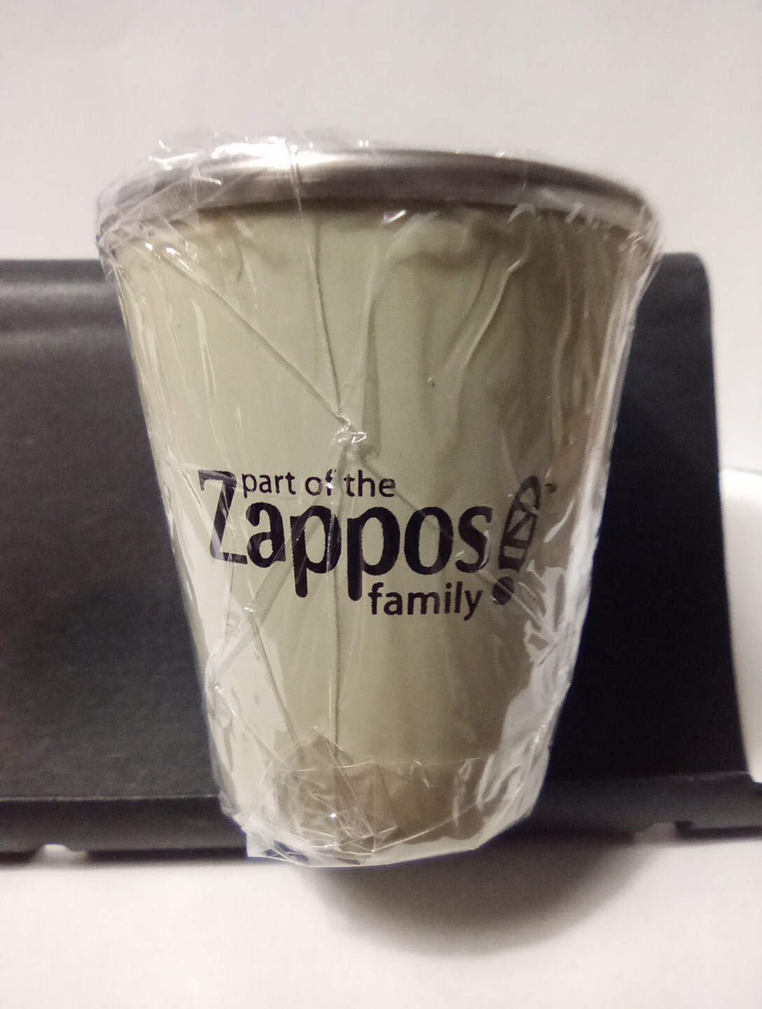 PART OF THE ZAPPOS FAMILY - REMEMBER ANYTHING LOGO ALUMINUM SHOT GLASS NEW!