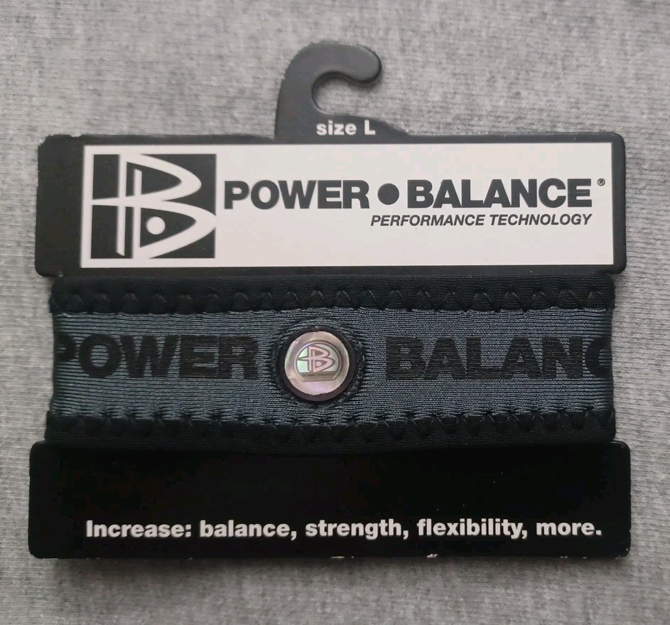 Rare Material POWER BALANCE bracelet Size Large. Color Gray and Black