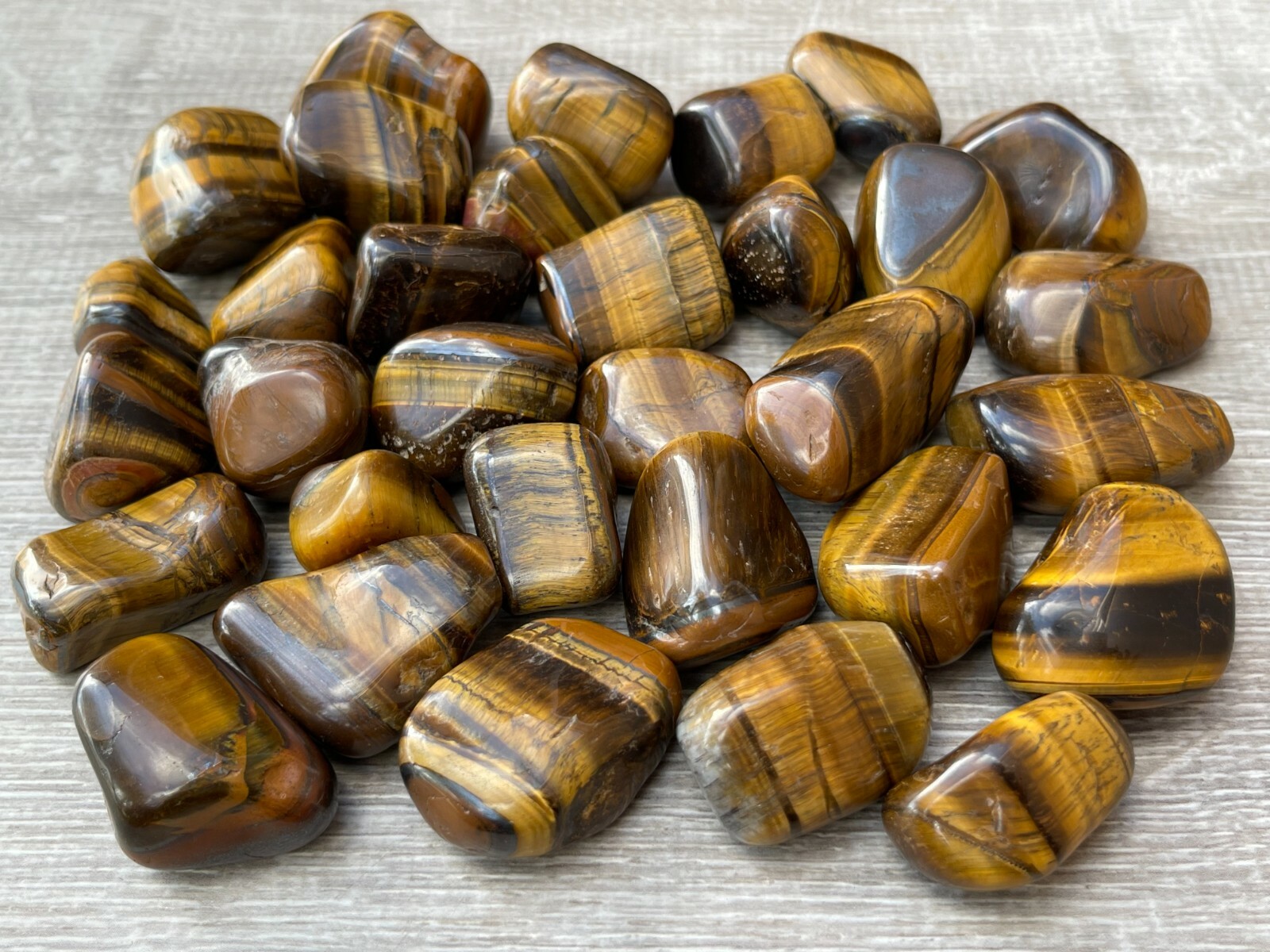 Grade A++ Gold Tiger Eye Tumbled Stones, 0.85"-1.5" Tumbled Tiger Eye, Bulk Lot