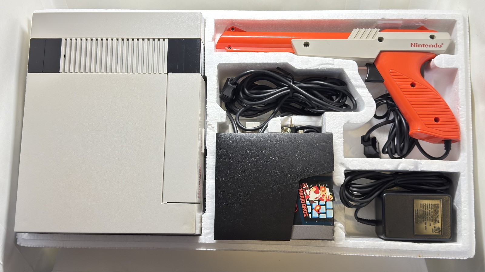 NES: Action Set- CIB- VG Cond.-Orange Zapper Version W/ game, manuals & Inserts