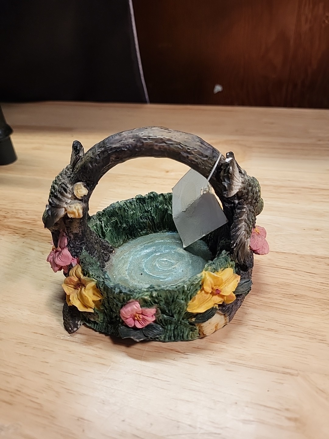 Flowered Hummingbird Basket Handled Figurine Made of Resin  4 x 4 1/2 Inches