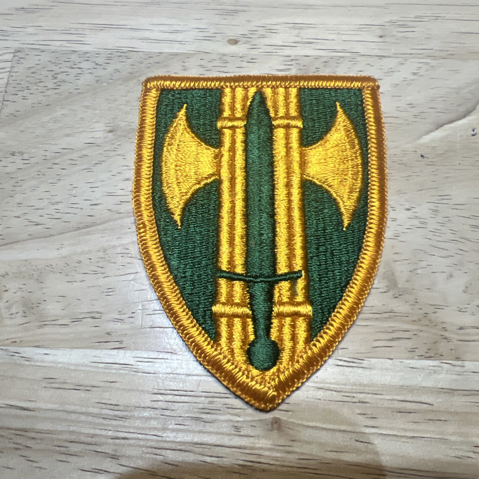 US Army 75th Infantry Division Patch Green Gold Embroidered Shield. Nos