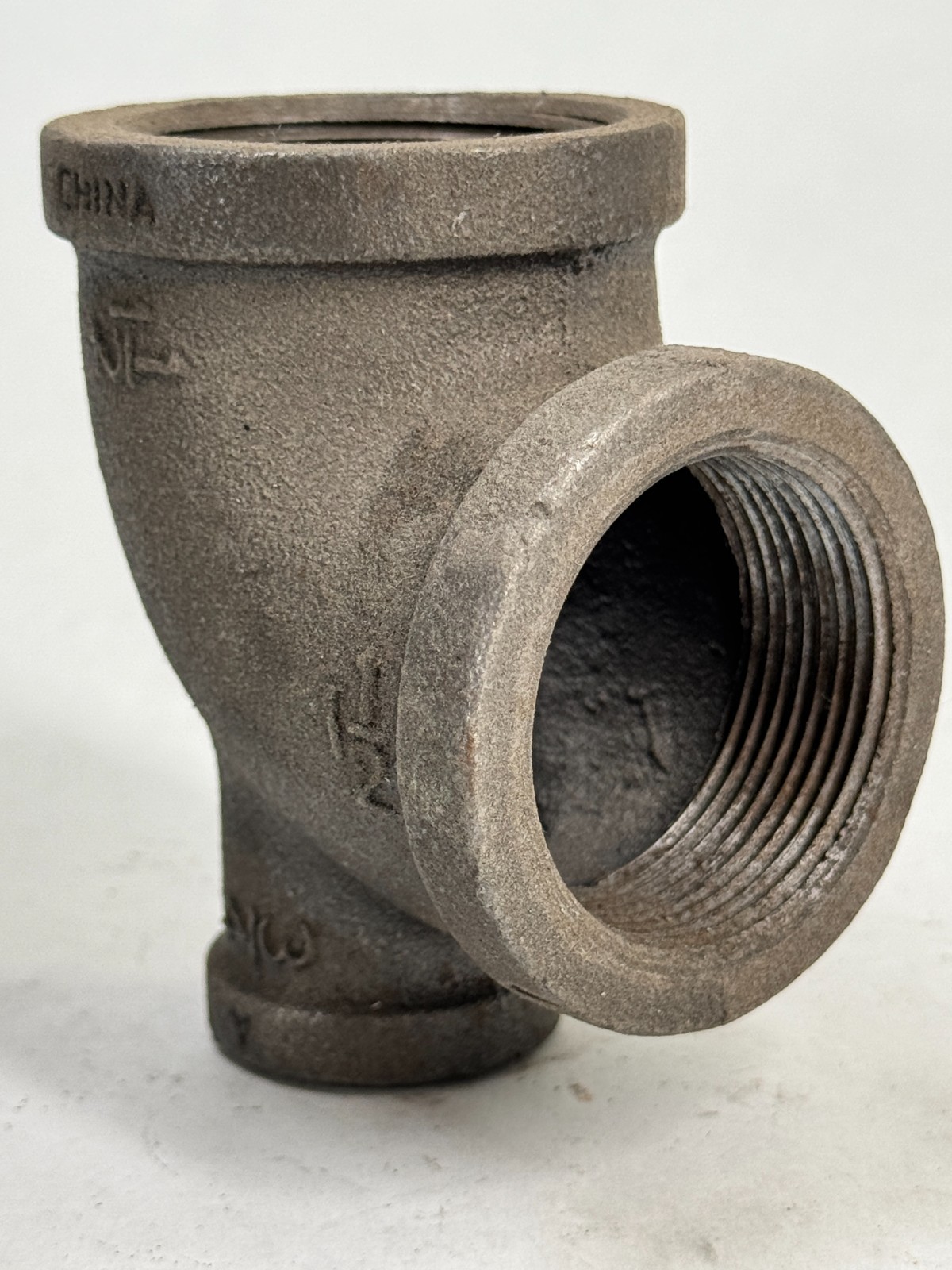 Tee 1-1/2" x 3/4" x 1-1/2" 150 lb Threaded Black Malleable Iron BMI Pipe Fitting
