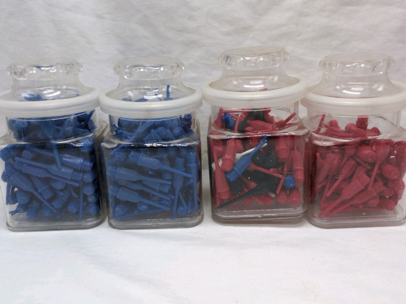 (4) Jars of Plastic Dart Tips Red Blue Black White