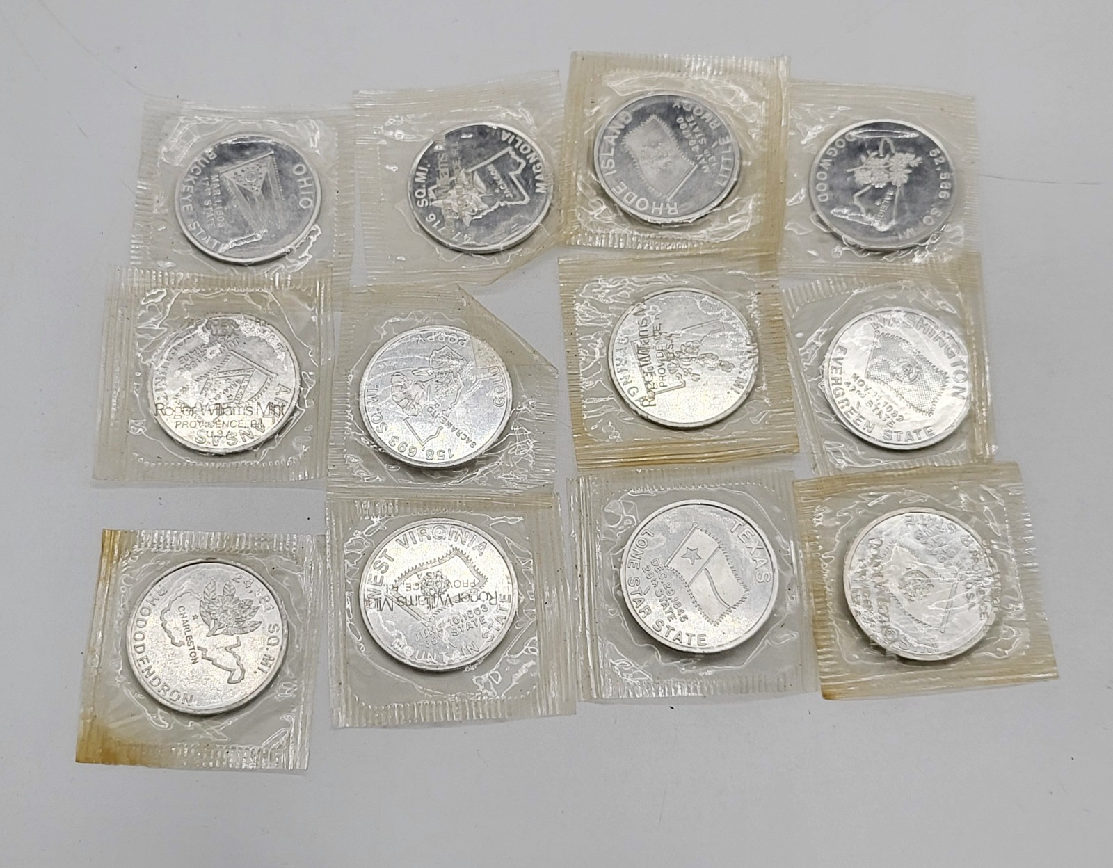 13 Roger Williams Mint state coins, all sealed