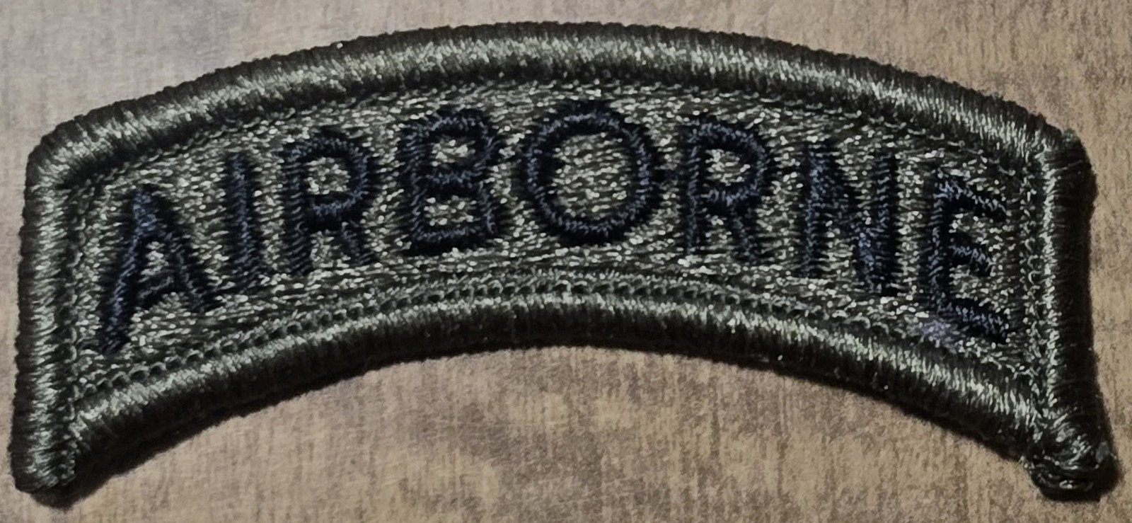 U.S. ARMY AIRBORNE TAB PATCH - SUBDUED OD GREEN BDU ARC ROCKER NEW NOS ORG USGI