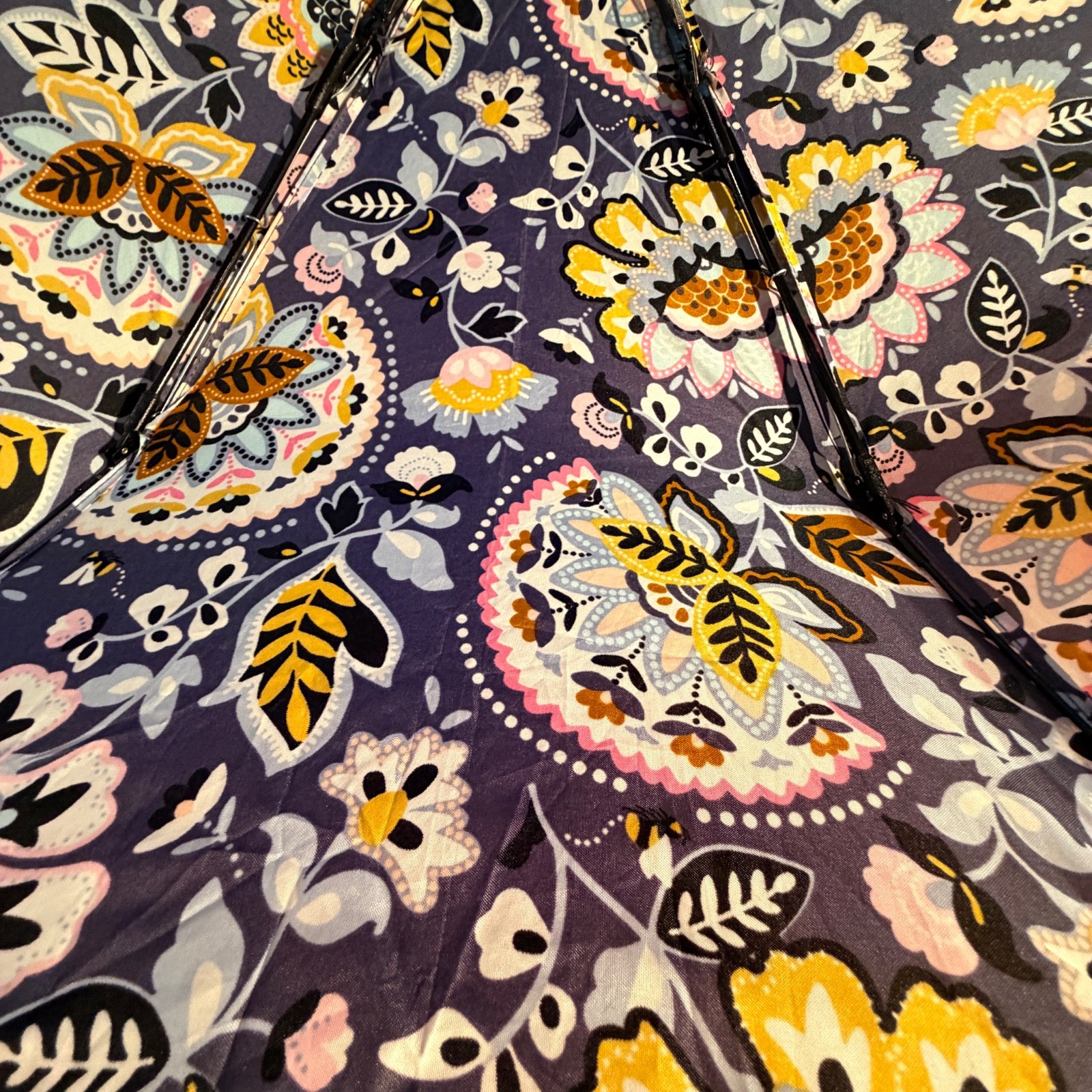Vera Bradley compact folding umbrella featuring a colorful floral pattern gray