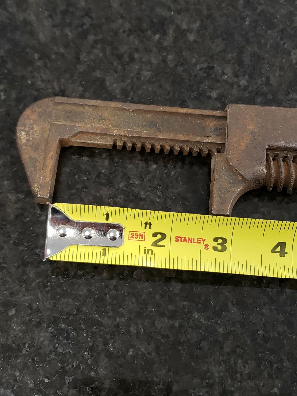 vintage pipe wrench opens to 2.5"