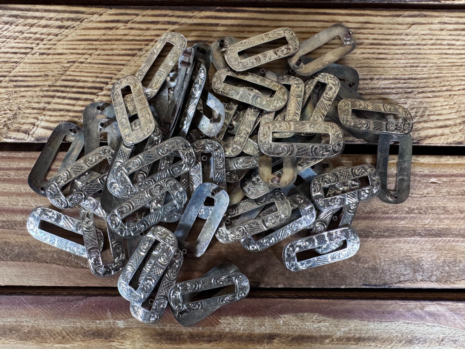 Unused silver engraved Cartouches mounts c.1900 single pin mounts 33mm by 15mm