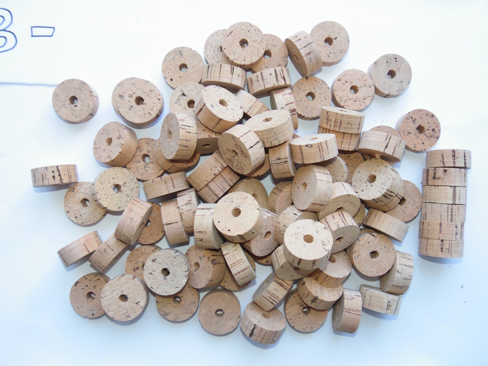 100 CORK RINGS 1 1/4"X1/2"  BORE 1/4" GRADE B (-)