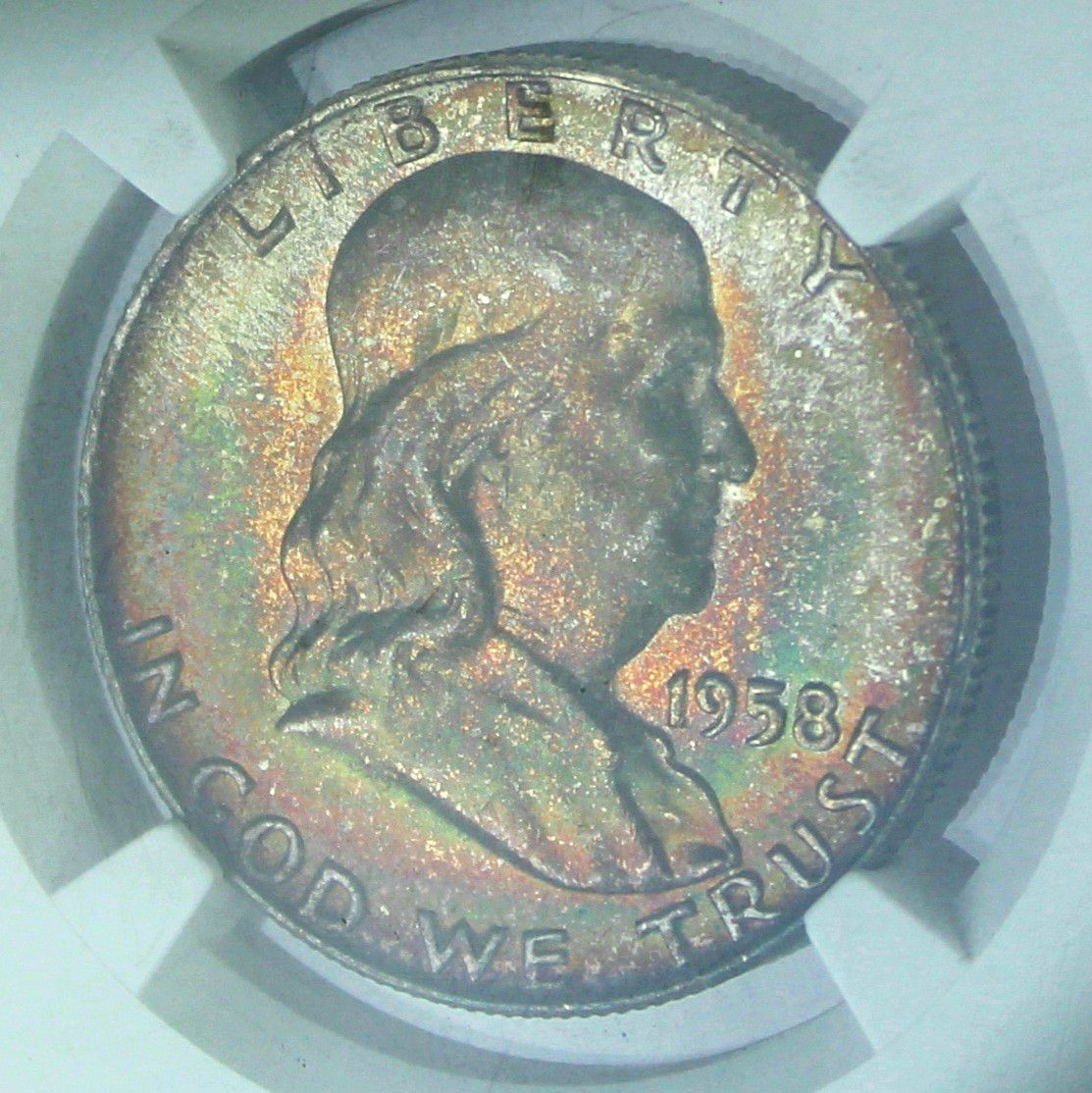 Rainbow Toned 1958 D Franklin Half Dollar NGC MS67 Silver 50c Coin Great Color!