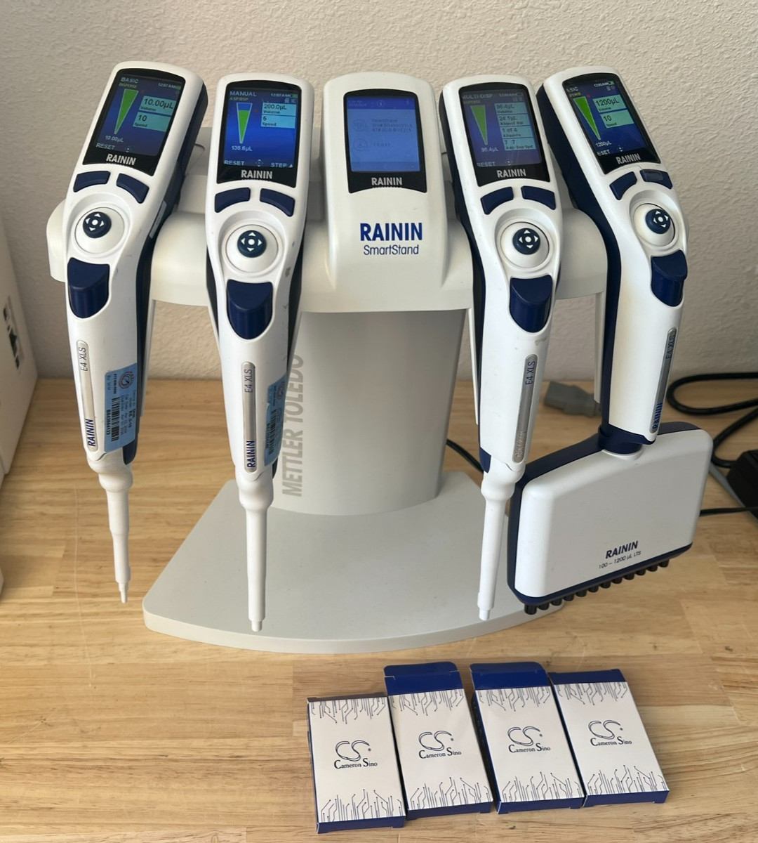 set of 4 rainin pipet-lite E4 XLS LTS electronic pipettes 10 100 200 1200