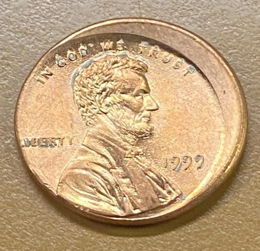 1999-P STRUCK 20% OFF CENTER DEFECT LINCOLN Cent NICE AU (c125)