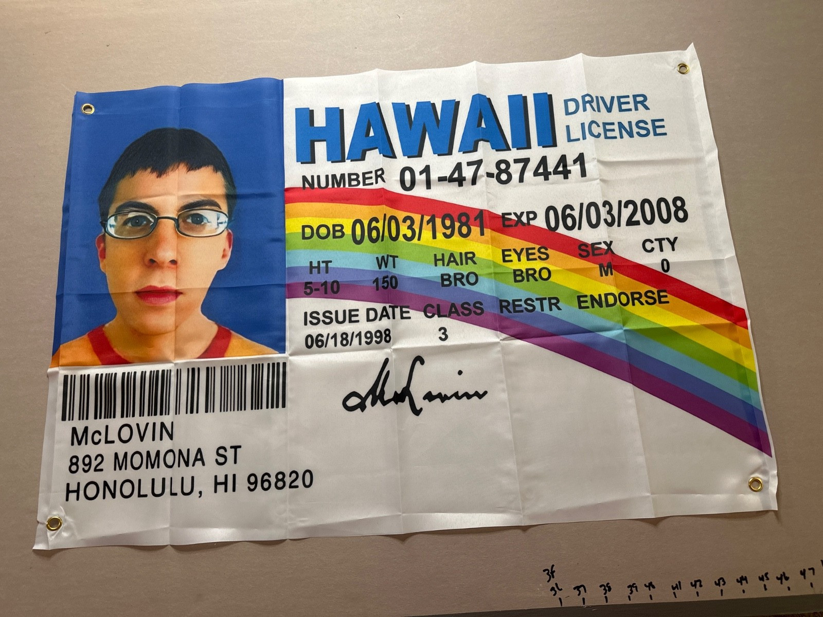 McLovin 2x3 Banner, one sided, grommets both sides.