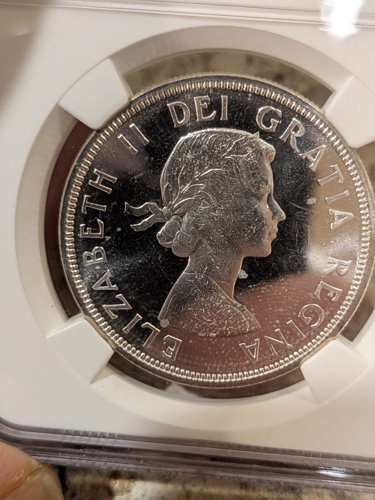 1964 CANADA SILVER $1 DOLLAR..NGC PL-65