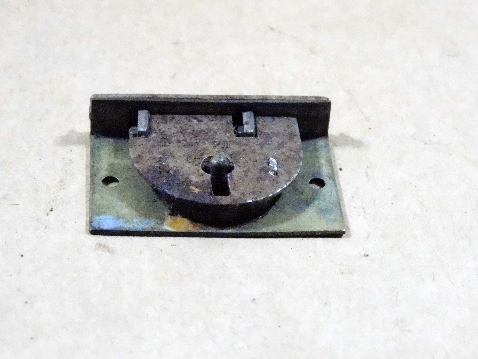 Antique miniature chest lock.