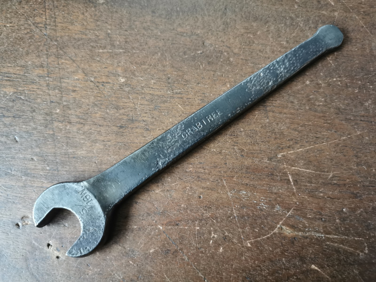 Vintage single ended spanner marked CRABTREE, 5/16 W, 158mm long.