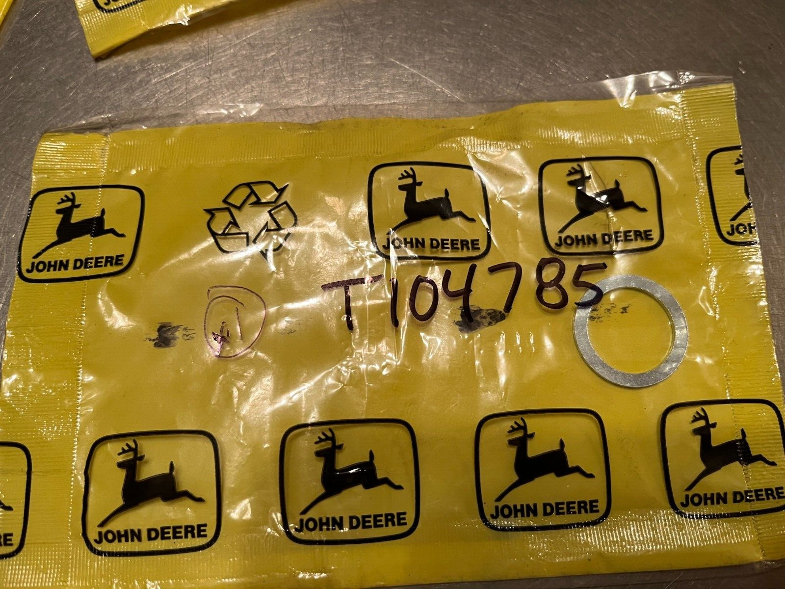 T104785  Genuine OEM  John Deere   Backup RING   QTY of 1 Ring per Order