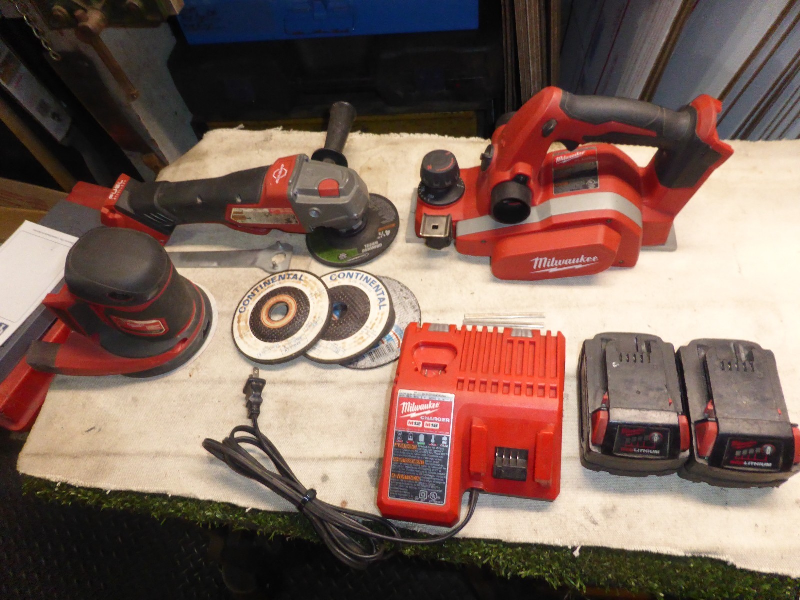 MILWAUKEE LOT OF 3 M18 TOOLS=SANDER, GRINDER/CUT OFF, PLANER + CHARGER & 2 BATT.