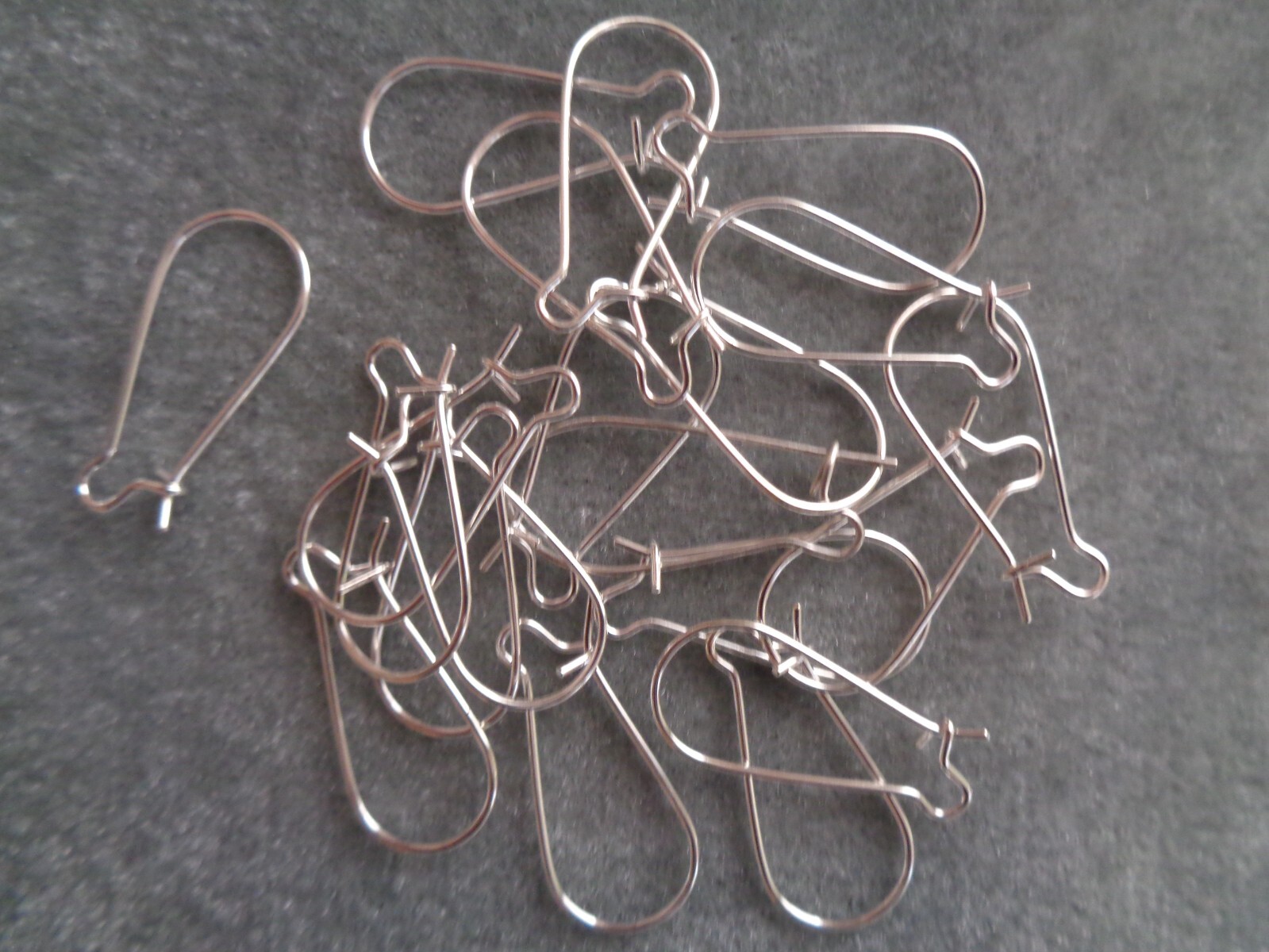 Kidney ear wire, silver plated, 25mm kidney with open loop, 21 gauge.