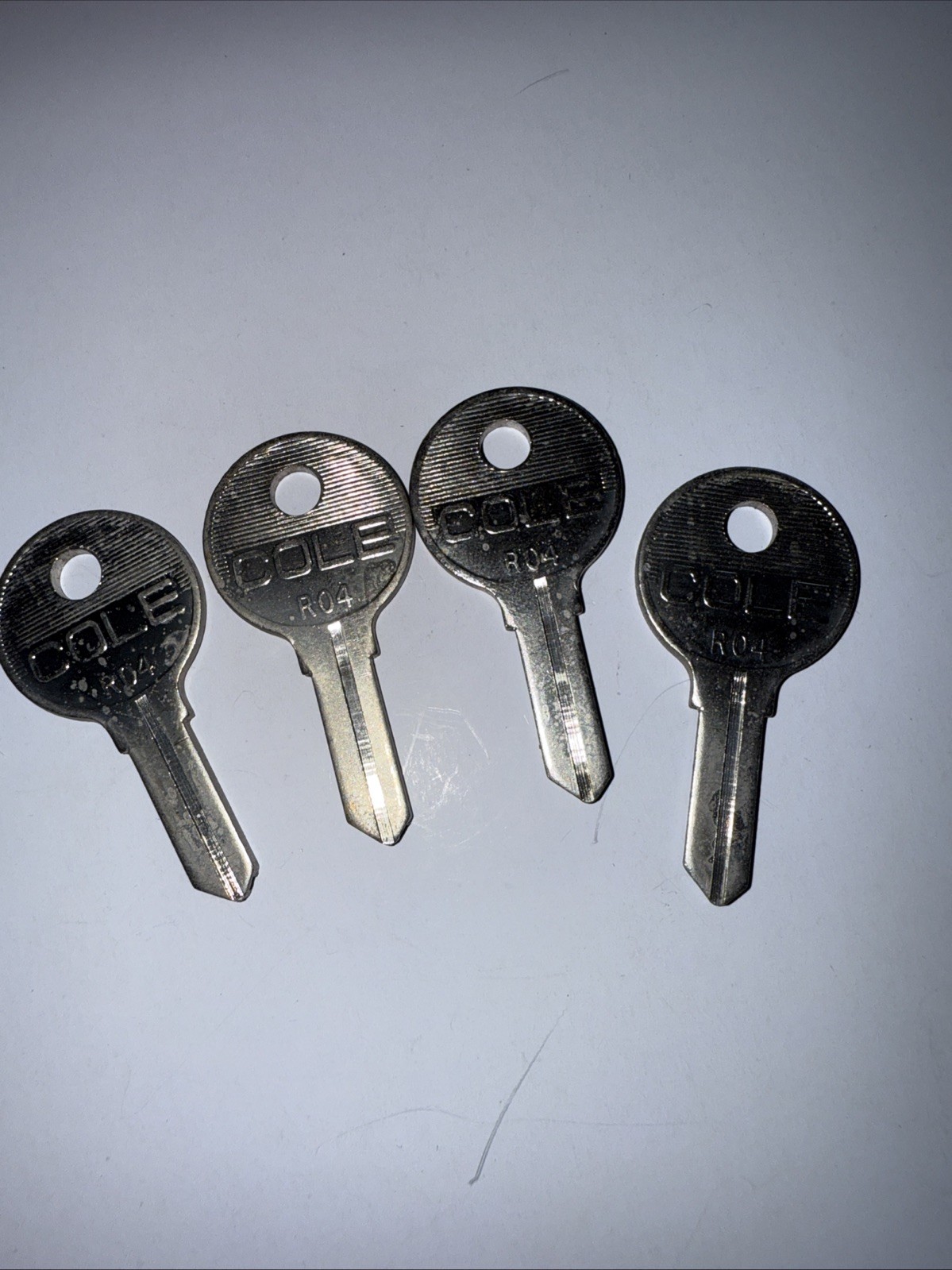 Lot of 4: Cole Silver 1069FL, R04, Key Blanks USA