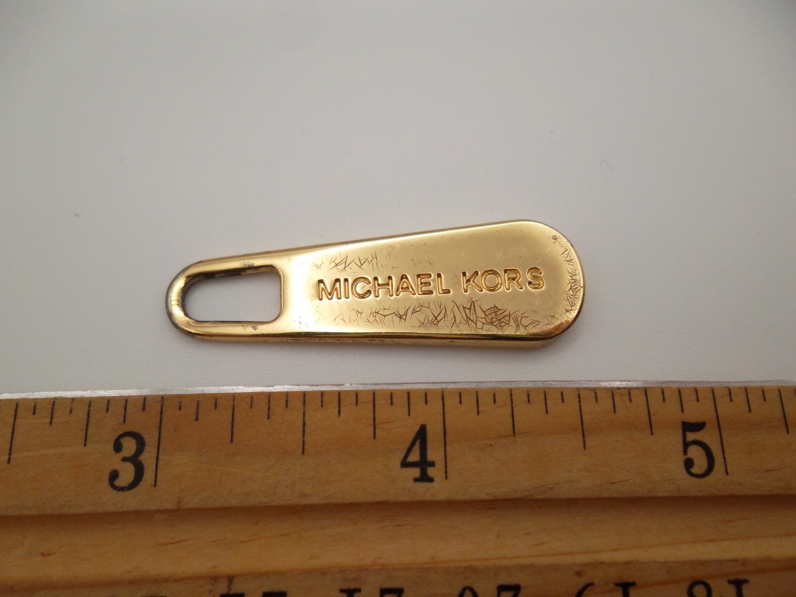 Michael Kors replacement handbag zipper pull gold tone, 1  1/2 "x 1/2"  inch