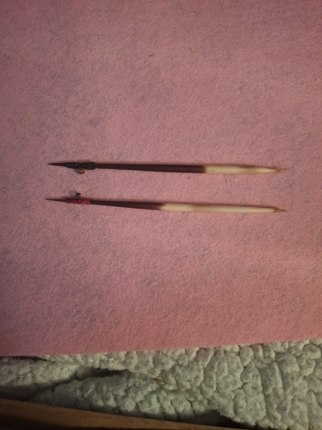 TWO HANDCRAFTED PORCUPINE QUILL FLOATS