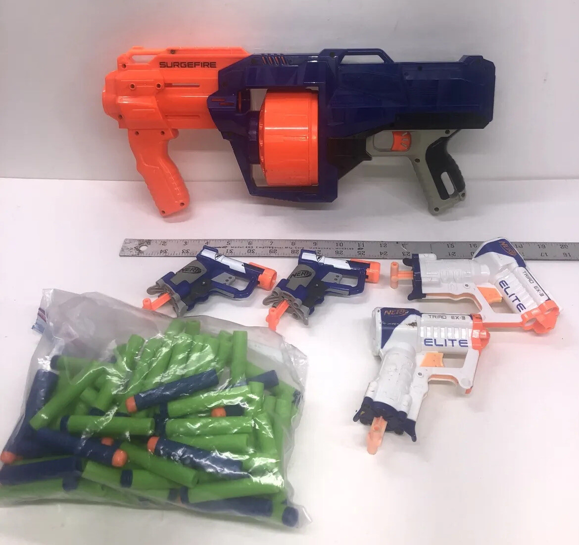 Nerf Gun Lot, 1 Surgefire Elite, 2 Triad EX-3 Elite, 2 Jolt, Foam Bullets.