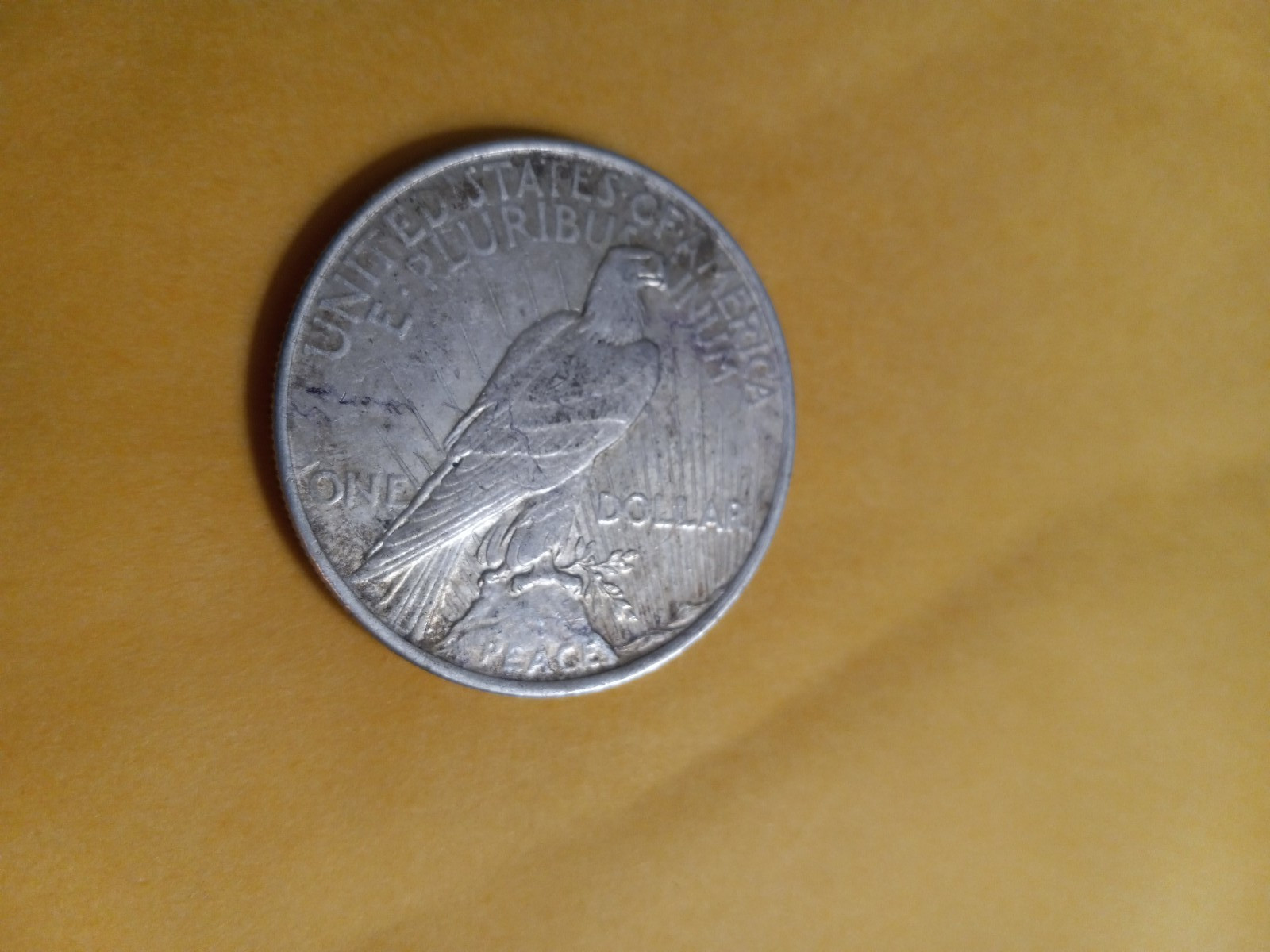 1922  Peace Dollar  Silver o.7734 oz.  EAGLE FACING RIGHT, REVERSE LIBERTY HEAD