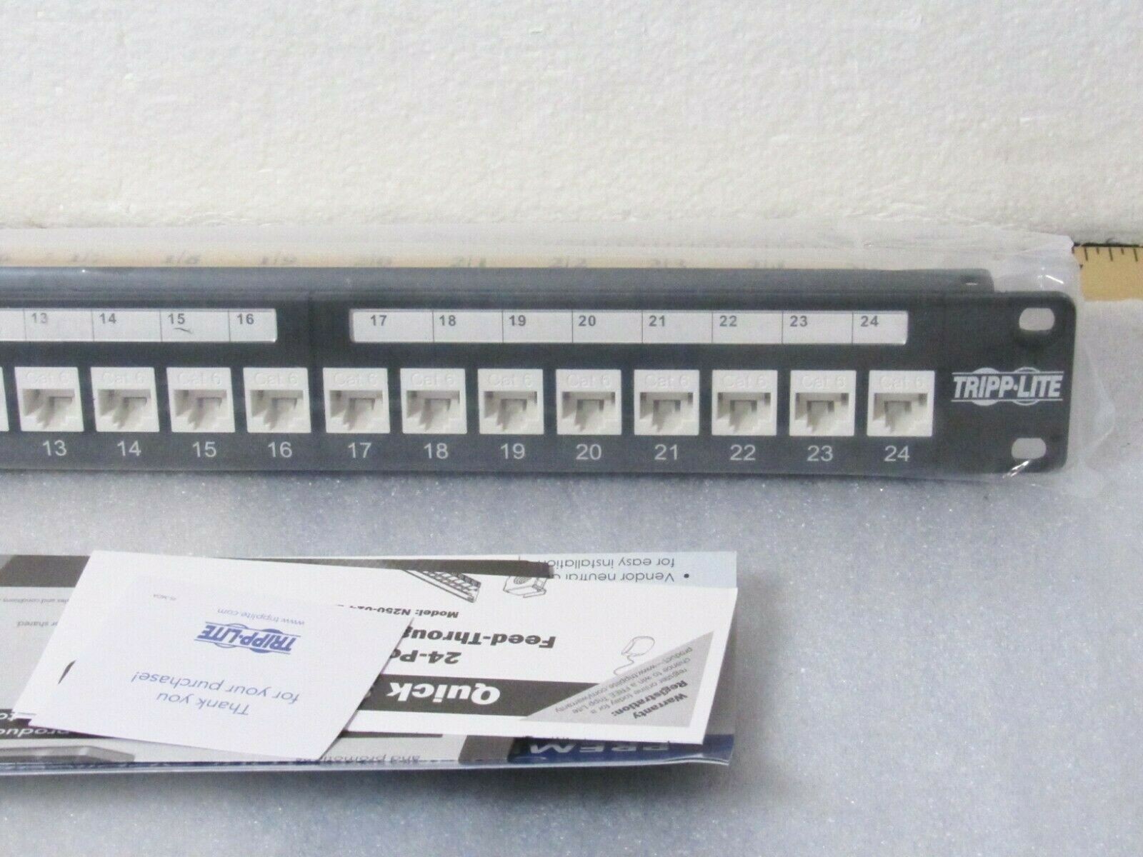 Tripp-Lite N250-024-LP 24-Port Cat6/Cat5 Low Profile Patch Panel Feed Thru [CTA]