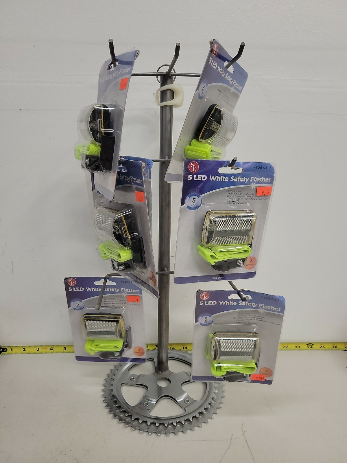 Sprocket bike store display rack with safety flashers included