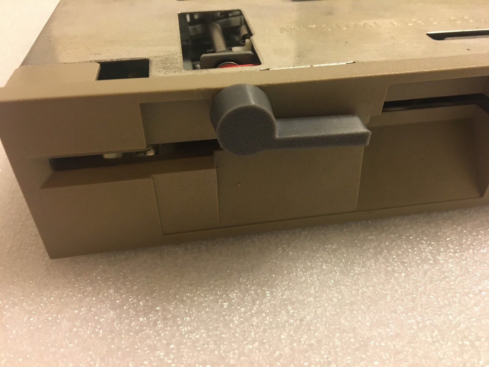 Mitsumi / Newtronics 5.25" floppy drive clamp handle