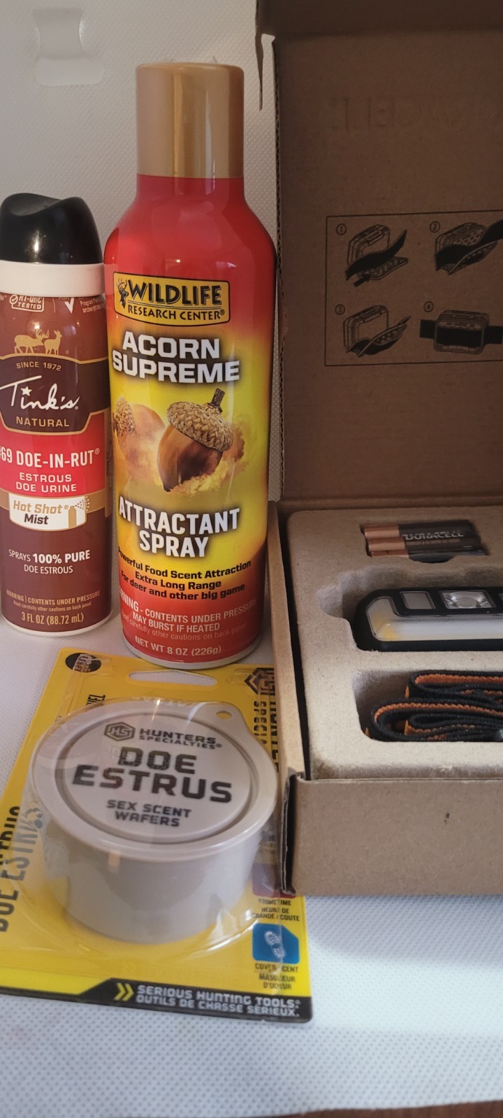 LOT OF"4" acorn supreme attractant,doe in rut,doe estrus ,and durasell head lamp