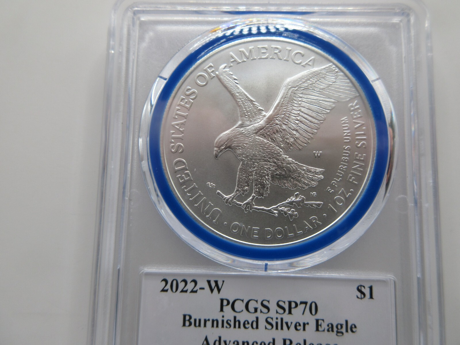 2022-W Burnished Silver Eagle Advanced Release; Mint Designer Damstra PCGS SP70
