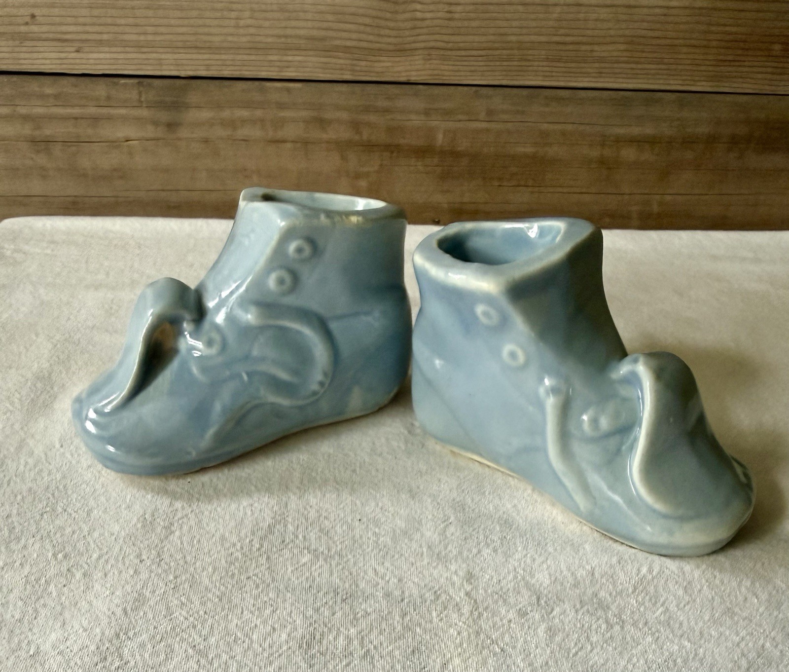 Two Vintage Blue Pottery Baby Shoe Planters