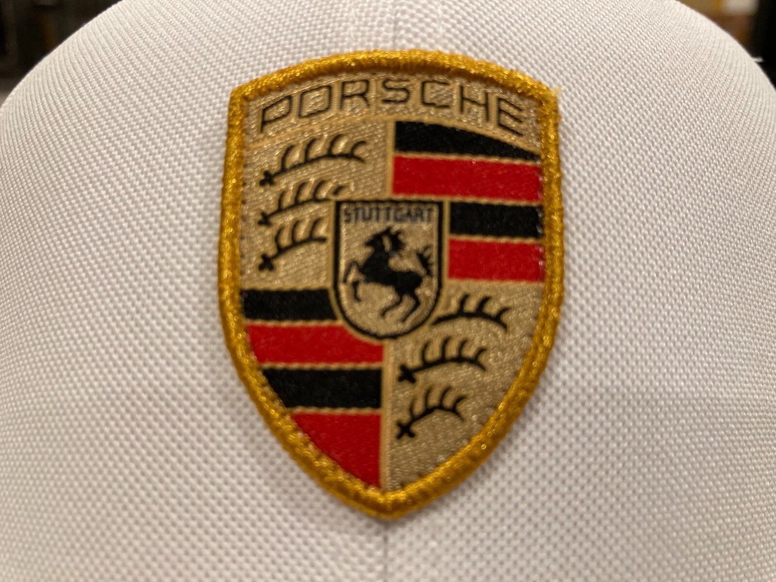 PORSCHE DESIGN NEW NEVER USED NOR DISPLAYED WHITE CRESTED FLEX FIT CLASSIC HAT.