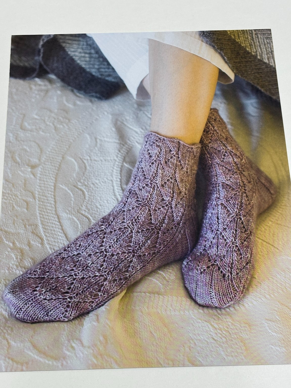 Which has Moved the Poet Socks Knitting Pattern Pages from Book