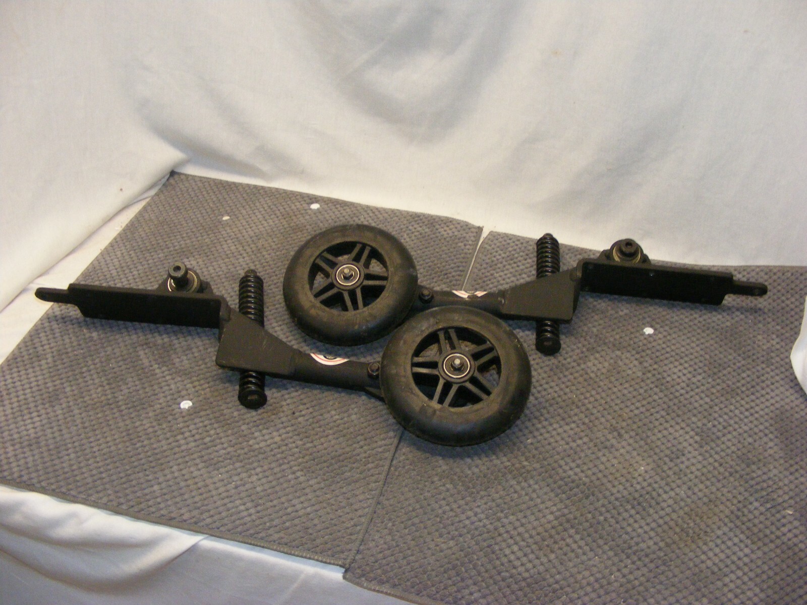 PRIDE 1103 ULTRA MOBILITY CHAIR GENUINE REPLACEMENT ANTI-TIP ASSEMBLY W/WHEELS