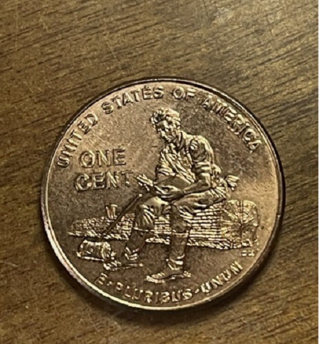 2009 Lincoln sitting on Log Bicentennial Penny