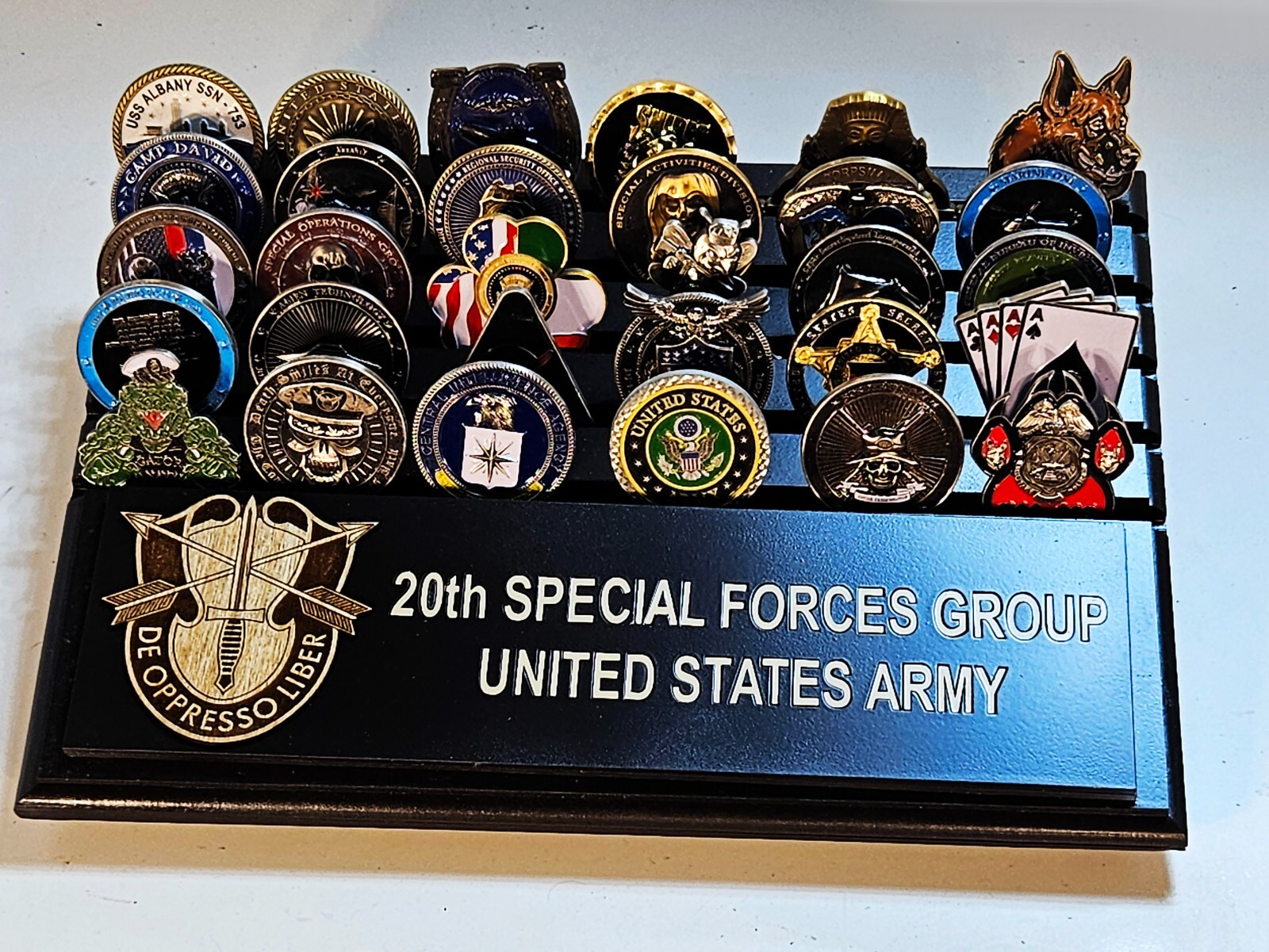US Army 20th Special Forces Group desktop challenge coin display appx 30 coins
