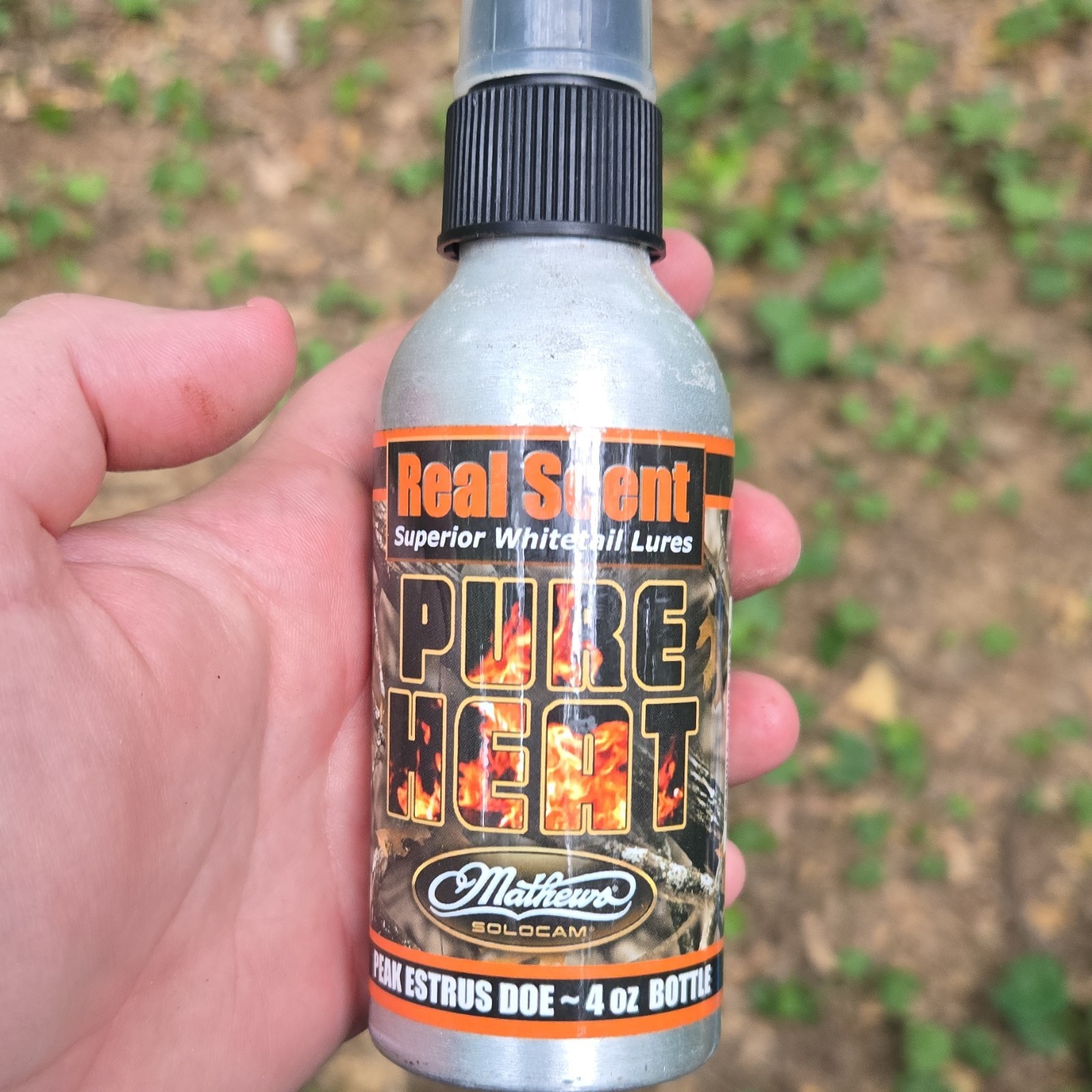 Real Scent Pure Heat Doe Estrus Deer Lure/Attractant Spray Bottle 4 oz
