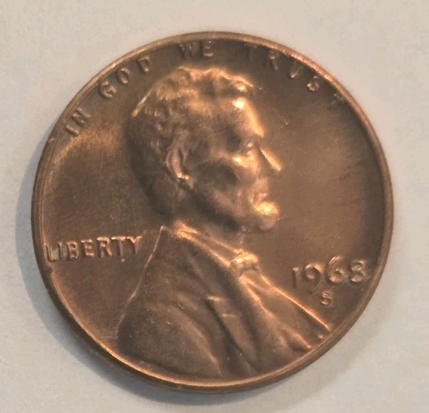 1968 S LINCOLN PENNY WITH ERROR ON TOP RIM & “L” IN LIBERTY EDGE IN GOD WE TRUST