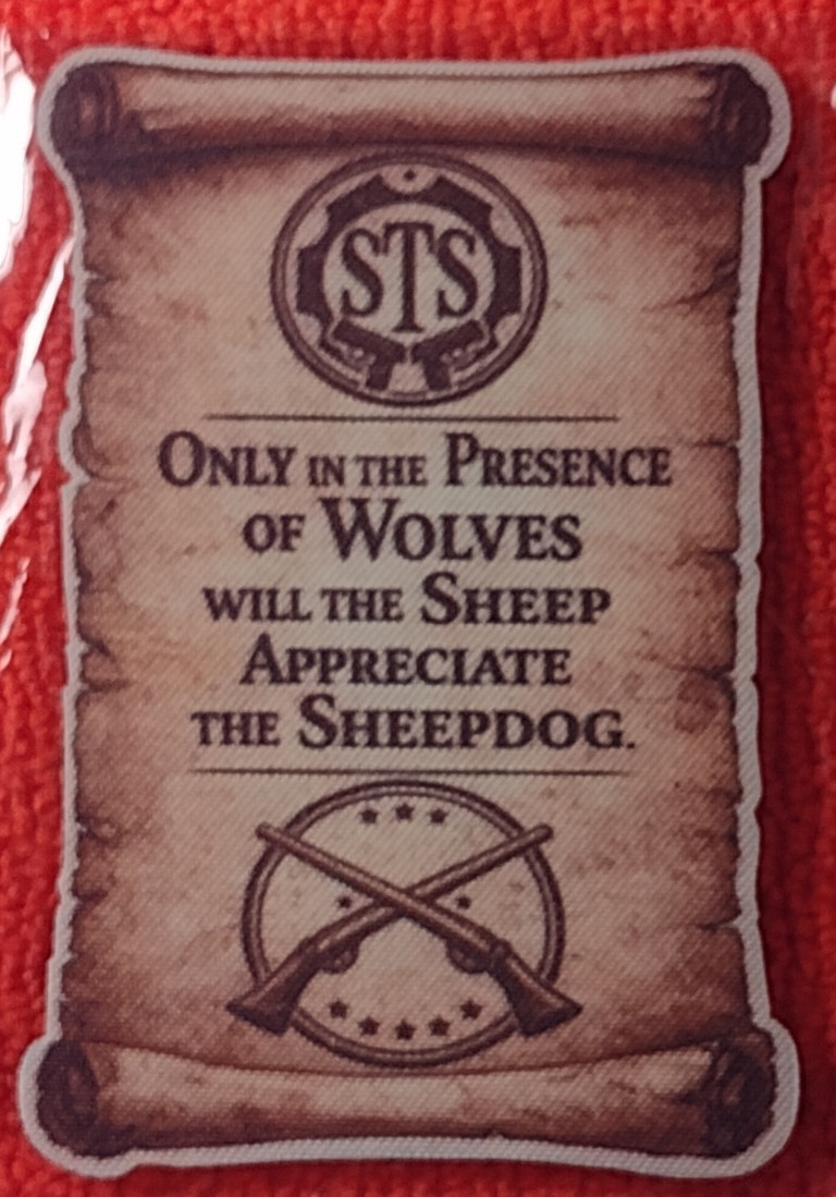 STS SHOT-SHOW 2026 IN THE PRESENCE OF WOLVES THE SHEEP APPRECIATE THE SHEEPDOG