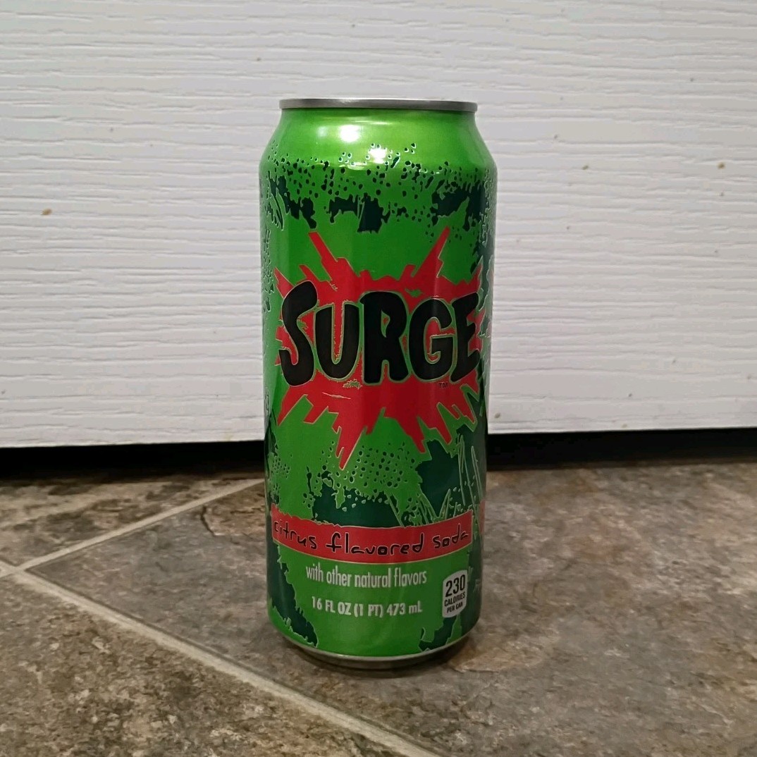 Surge Citrus Soda Can - Green, Red & Black 16 fl oz UNOPENED
