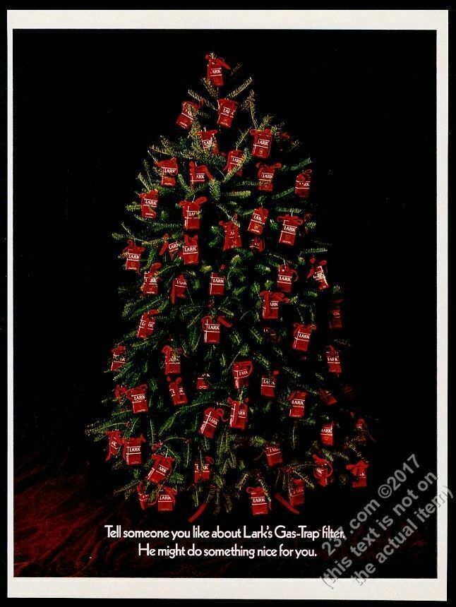 1969 Lark cigarettes packs on Christmas tree photo vintage print ad