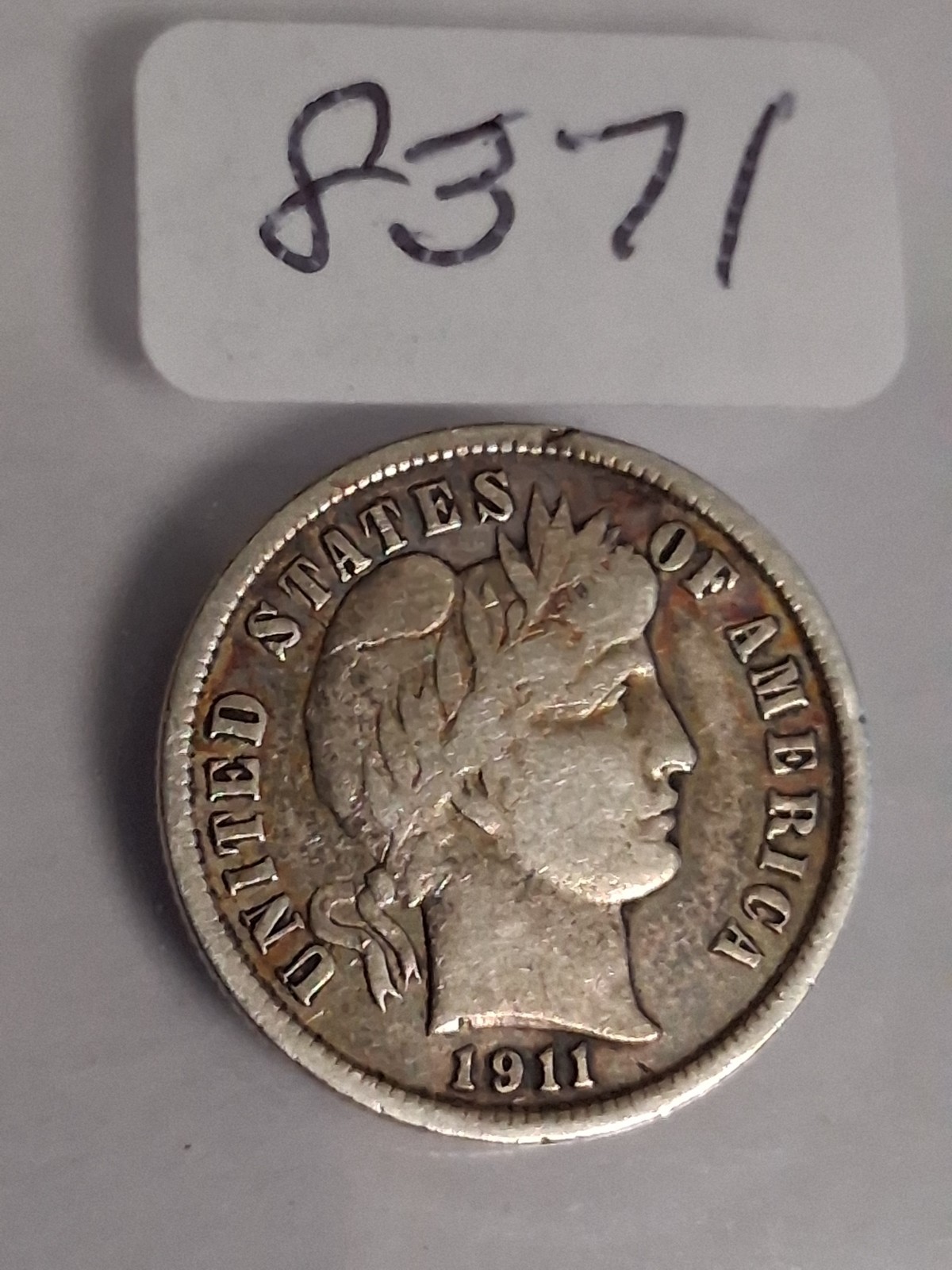 1911 P BARBER DIME - COIN HAS A VERY VERY SLIGHT BEND - STILL NICE COIN -