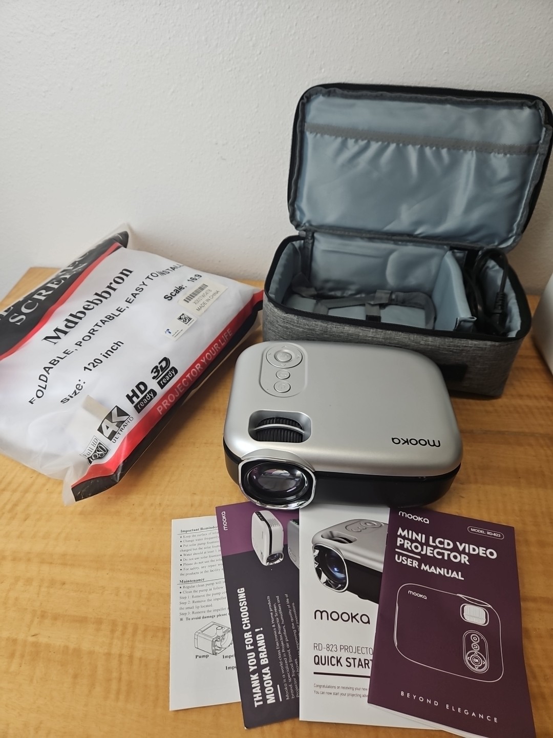 Mooka: Mini LCD Video Projector - RD-823 in soft case AND 120" projector screen